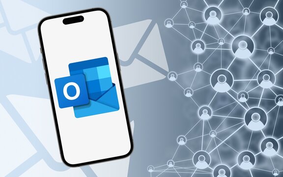 Microsoft Outlook Logo,  email client, with functions as calendaring, task managing, contact managing, notes, shown on a modern smartphone in front of a gray background with symbolic linked contacts