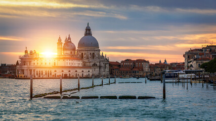 Sunset in Venice. Image of Grand Canal in Venice, with Santa Maria della Salute Basilica in the...