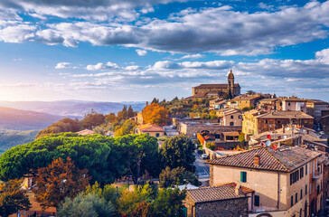View of Montalcino town, Tuscany, Italy. Montalcino town takes its name from a variety of oak tree that once covered the terrain. View of the medieval Italian town of Montalcino. Tuscany - obrazy, fototapety, plakaty