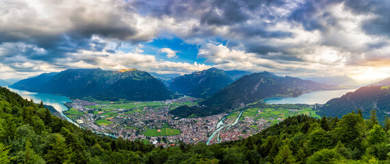 View from Harder Kulm in Swiss Interlaken in summer sunset. Turquoise Lake Thun and Brienz in...