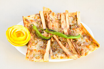 Kiymali pide. Turkish pide with minced meat. Turkish pizza mince pita Pide on white background. Etli ekmek. Kusbasi kasarli pide.