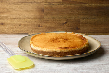 Pump cheesecake on wood background