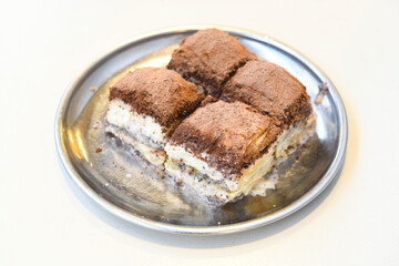Turkish Dessert Sobiyet Baklava, mussels baklava and classic baklava with Pistachio . Didye, Cevizli, Fistikli Baklava, top view.