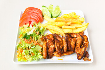 Chicken wings barbeque in a dish with BBQ grill sauce . Izgara tavuk kelebek sis kanat. Tavuk sis, gogus.