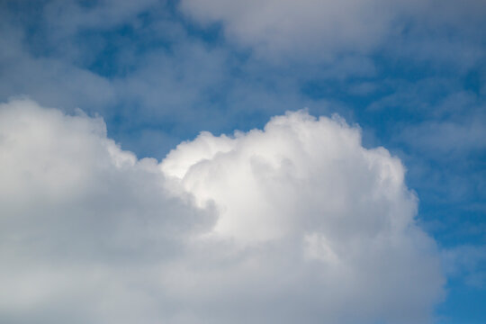 Blue sky background with clouds © sezer66