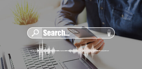 Data Search Technology Search Engine Optimization. man's hands are using a computer keyboard to...