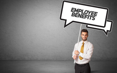 Fototapeta premium business person in casual holding road sign