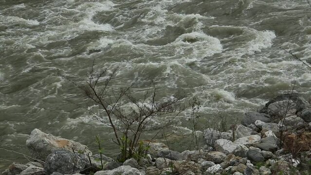 Stormy and turbulent flow of Western Morava river in rocky mountain environment. Serbia
