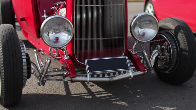 Classic american vintage red roadster front view