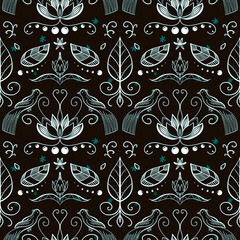 Ethnic pattern with birds on a black background