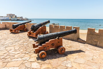 Fototapeta na wymiar Cannons near Mirbat castle near the sea in Mirbat town, Sultanate of Oman