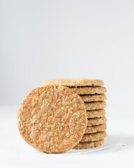Stack of oat cookies, homemade oatmeal cookies, stack of thin oat biscuits