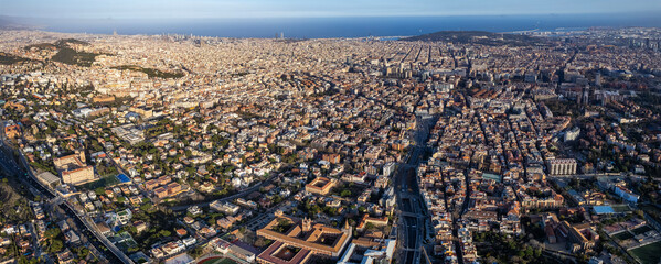 Obraz na płótnie Canvas Aerial around the city Barcelona in Spain on a sunny morning in spring.