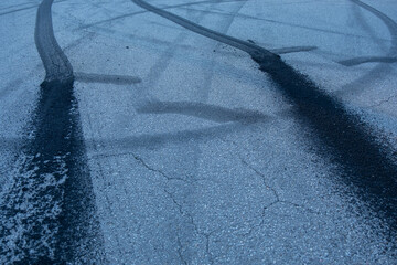 Traces from car tires on the asphalt. Auto sport