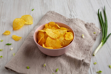 Crunch Green Onion Potato Chips in a Pink Bowl