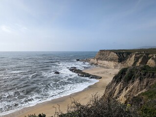 view of the coastal cliffs over the Pacific Ocean in Half Moon Bay, California