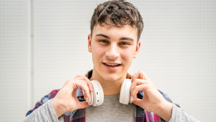 portrait of young Caucasian man teenager 18 or 19 years old outdoor