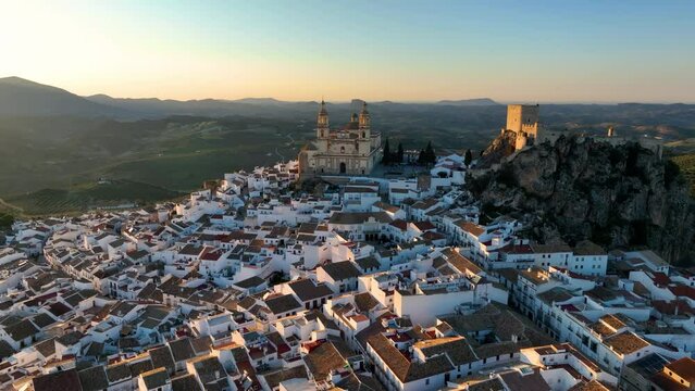 aerial view of Castillo de Olvera Towering On White Village In Olvera, Province of Cadiz, Spain