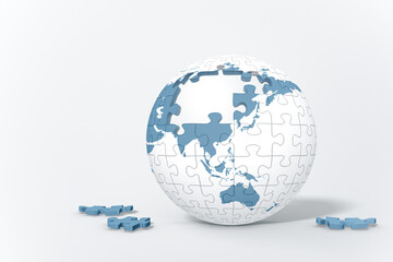 Put together a globe shaped puzzle.