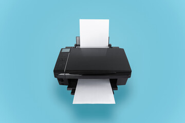 Close-up of black printer and white paper