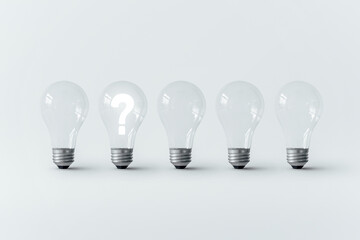 Question mark glowing from one of several light bulbs.