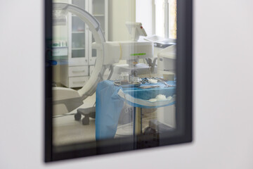 View of the doors to the operating room. Preparation for surgery. Surgical instruments on the...