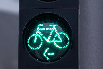 European green lights for bicicle lane. Traffic light for bikers