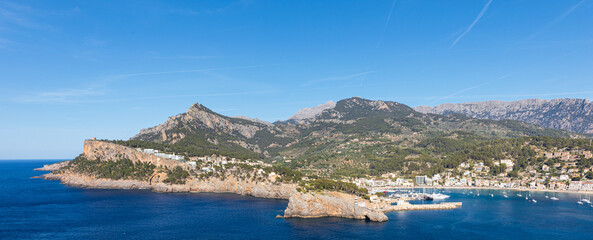 Naklejka na ściany i meble Panoramic of Puerto de Sóller (Port de Sóller), natural harbour in the Serra de Tramuntana mountain range on the island of Mallorca (Balearic Islands, Spain).