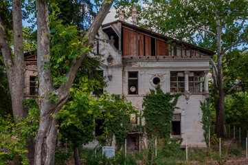 Fototapeta na wymiar Desolate Remnants Abandoned Serbian Manor Forgotten Relics: Deserted Serbian Mansion Abandoned Echoes: Serbian Estate in Ruins