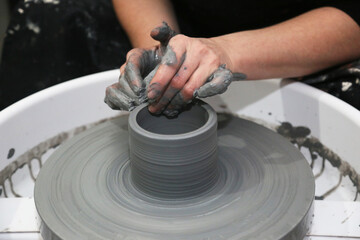 Ceramic artist making jug at ceramic workshop in in Istanbul, Turkey.