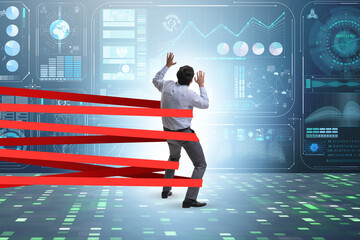 Businessman being harnessed and restricted