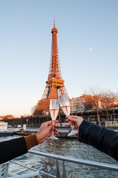 romantic cheers at the eiffel tower in paris