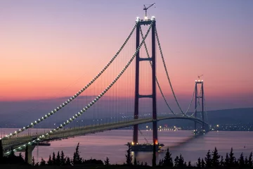 Zelfklevend Fotobehang 1915 Canakkale Bridge in Canakkale, Turkey. World's longest suspension bridge opened in Turkey. Turkish: 1915 Canakkale Koprusu. Bridge connect the Lapseki to the Gelibolu. © Ahmetpekts