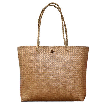 A tote bag woven from natural materials isolated on transparent background