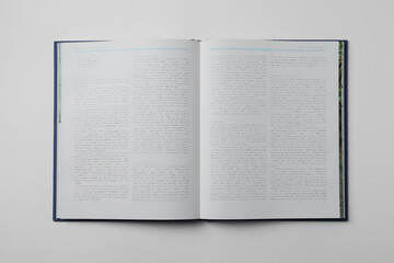 Obraz premium Open book on white background, top view