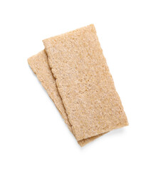 Fresh crunchy rye crispbreads on white background, top view. Space for text