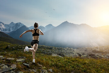 Woman running against natural landscape
