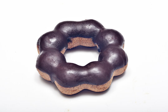  Pon de ring chocolate donut isolated on white backgrround
