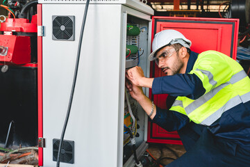 Technical engineer workers working in control room plant at industry factory to service maintenance...