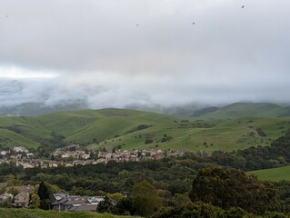 Fototapeta premium clouds over the house on the East San Francisco Bay hills