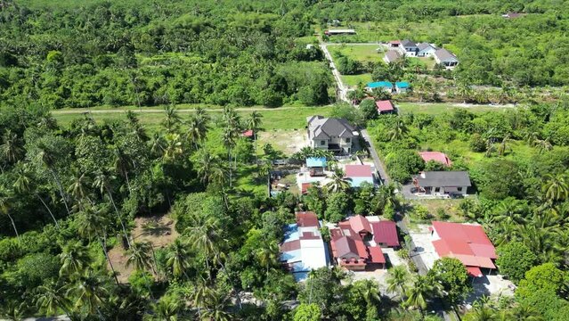 Aerial view green Malays house near agriculture farm