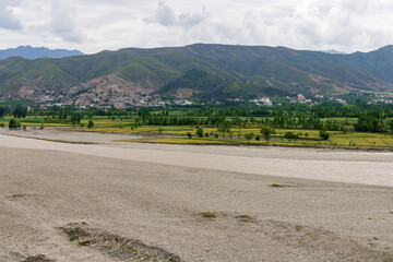 Wide angle view a river after flood in the valley