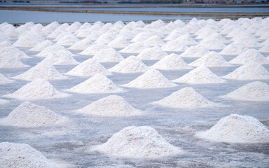 Sea salt farm. Pile of brine salt. Raw material of salt industrial. Sodium Chloride mineral....