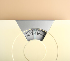 crop of weight scale display to show overweight at 84 kilogram , overweight or diet background concept