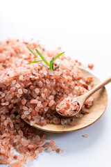 Himalayan pink salt is herb seasoning from himalaya and isolated on white background with copy space