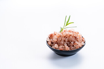Himalayan pink salt is herb seasoning from himalaya and isolated on white background with copy space