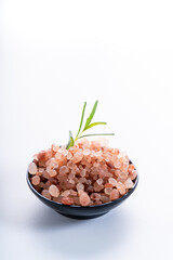 Himalayan pink salt is herb seasoning from himalaya and isolated on white background with copy space