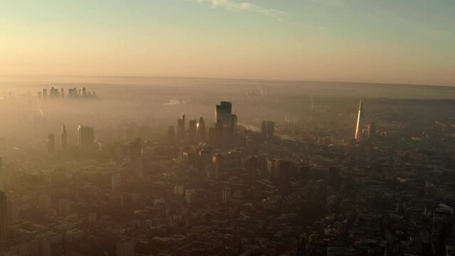 Establishing aerial shot over central London on a foggy morning