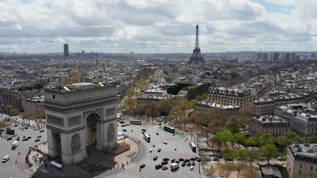 Aerial view of Arc de Triomphe with skyline of Paris and famous Champs Elysees street,  France