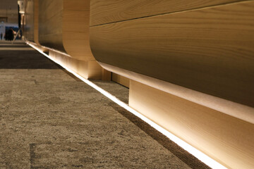 Flooring indirect lighting warm light.
